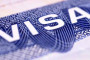 Иностранцев с электронной визой освободили от регистрации в миграционной службе
